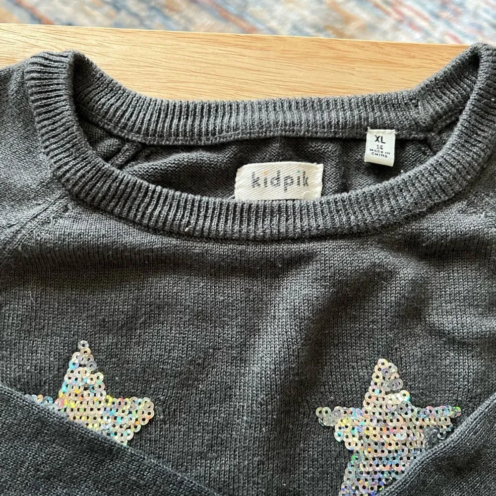 Girls long sleeve sweater with silver sequin star detail